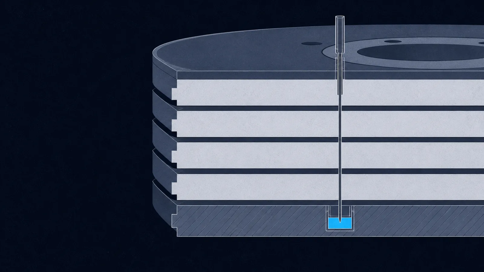 A cutaway of six stacked disk layers with a probe descending to a small pocket in the lowest one.