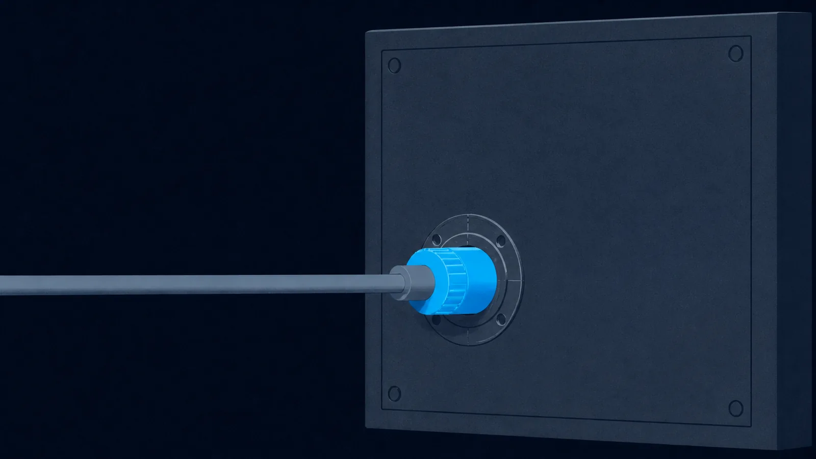A single cable ending in a plug seated in one socket on a large featureless panel.
